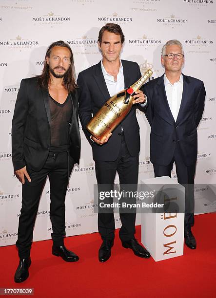 Bob Sinclar, Professional Tennis Player Roger Federer, and Moet & Chandon CEO Stephane Baschiera attend Moet & Chandon Celebrates Its 270th...