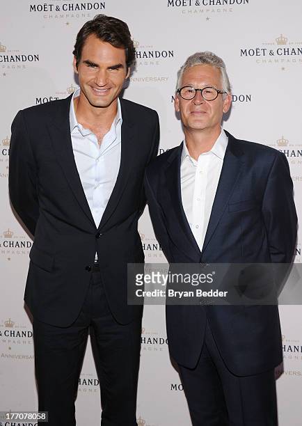 Professional Tennis Player Roger Federer and Moet & Chandon CEO Stephane Baschiera attend Moet & Chandon Celebrates Its 270th Anniversary With New...