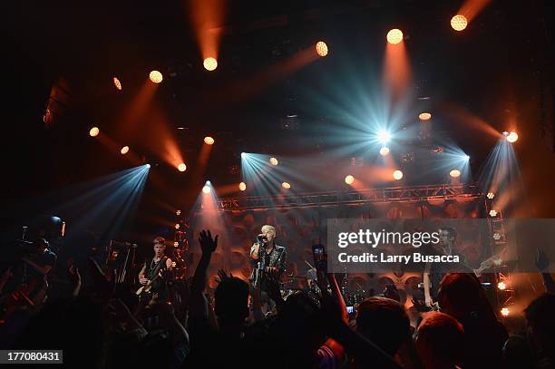 Nash Overstreet, Ryan Follese and Ian Keaggy of Hot Chelle Rae performs during a Crazy Good VMA Concert event presented by MTV and Pop Tarts at Music...