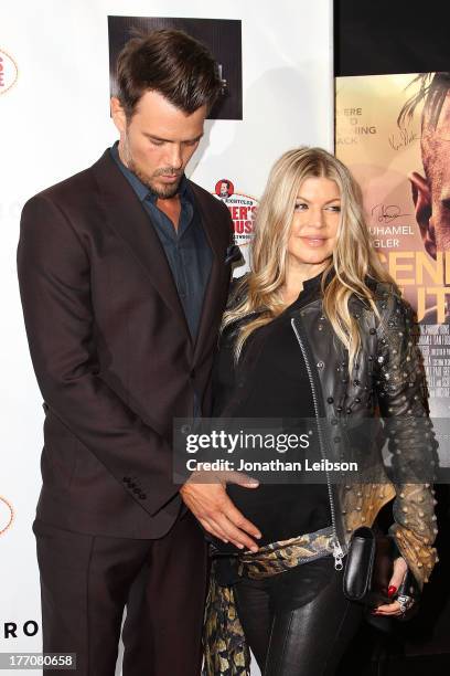 Josh Duhamel and Fergie Duhamel arrive to the "Scenic Route" Los Angeles Premiere at Chinese 6 Theater Hollywood on August 20, 2013 in Hollywood,...