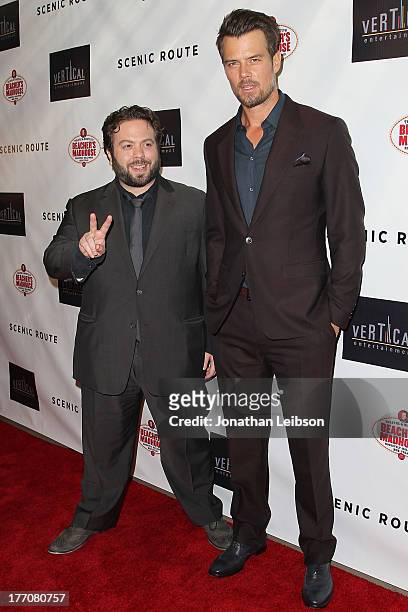 Dan Fogler and Josh Duhamel arrive to the "Scenic Route" Los Angeles Premiere at Chinese 6 Theater Hollywood on August 20, 2013 in Hollywood,...