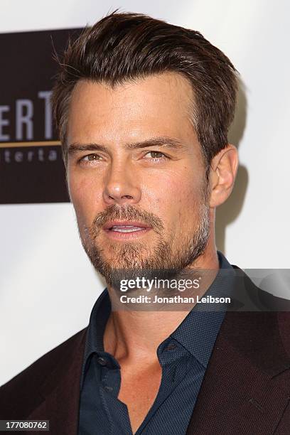 Josh Duhamel arrives to the "Scenic Route" Los Angeles Premiere at Chinese 6 Theater Hollywood on August 20, 2013 in Hollywood, California.