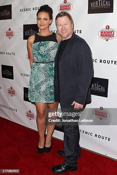 Miracle Laurie and Christopher May arrive to the "Scenic Route" Los Angeles Premiere at Chinese 6 Theater Hollywood on August 20, 2013 in Hollywood,...