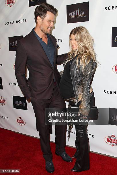 Josh Duhamel and Fergie Duhamel arrive to the "Scenic Route" Los Angeles Premiere at Chinese 6 Theater Hollywood on August 20, 2013 in Hollywood,...