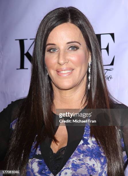 Patti Stanger arrives at the Have Faith Swimgerie fashion event held at Kyle by Alene Too on August 20, 2013 in Beverly Hills, California.