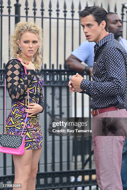 Actors AnnaSophia Robb and Jake Robinson film a scene at the "Carrie Diaries" set in the Lower East Side on August 20, 2013 in New York City.