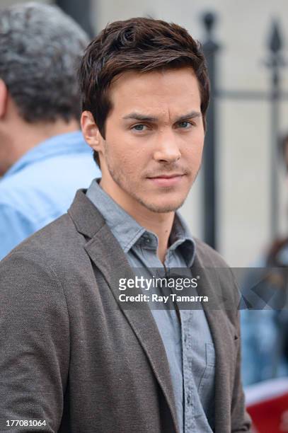 Actor Chris Wood films a scene at the "Carrie Diaries" set in the Lower East Side on August 20, 2013 in New York City.