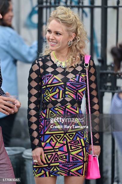 Actress AnnaSophia Robb films a scene at the "Carrie Diaries" set in the Lower East Side on August 20, 2013 in New York City.