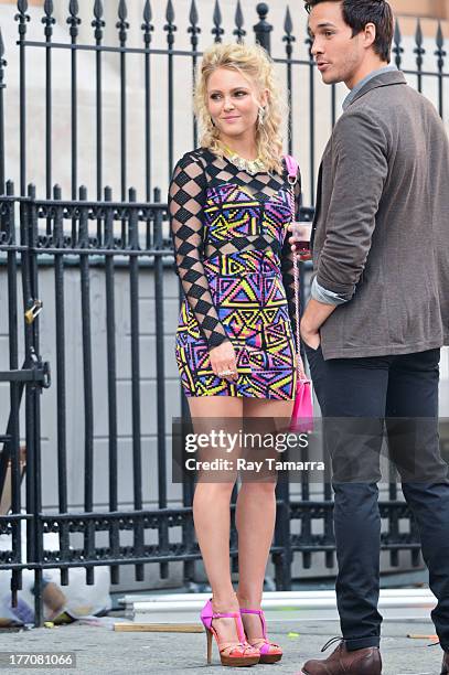 Actors AnnaSophia Robb and Chris Wood film a scene at the "Carrie Diaries" set in the Lower East Side on August 20, 2013 in New York City.