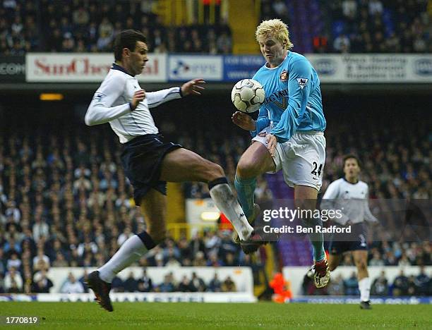 Gustavo Poyet of Tottenham Hotspur challenges Sean Thornton of Sunderland during the FA Barclaycard Premiership match between Tottenham Hotpsur and...