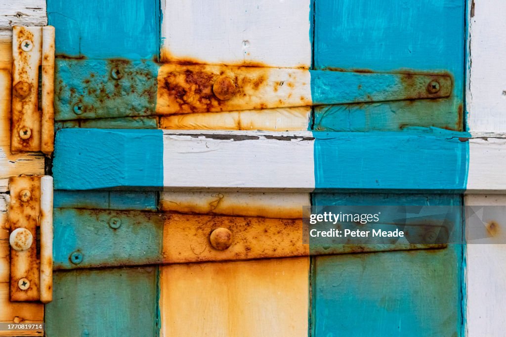 Rusty hinge on an Isle of Wight beach hut