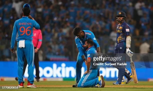 Mohammed Shami of India celebrates the wicket of Kasun Rajitha of Sri Lanka to become India's all time leading wicket taker in World Cup cricket...