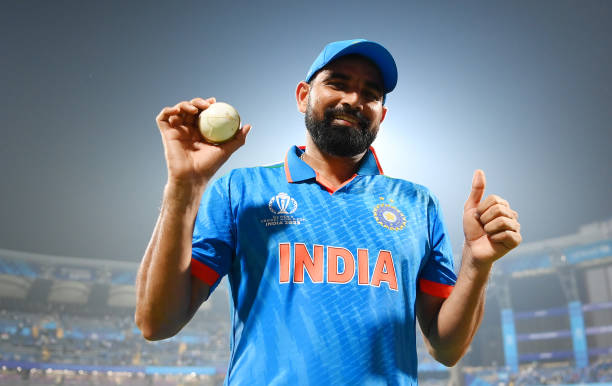 Mohammed Shami of India poses after taking five wickets following the ICC Men's Cricket World Cup India 2023 between India and Sri Lanka at Wankhede...
