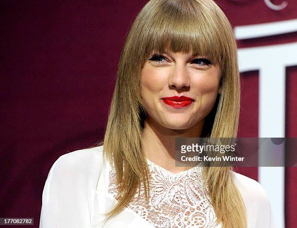 Musician/actress Taylor Swift, wearing Elie Saab top and shorts, attends a press event for breaking The Staples Center's record of most sold-out...