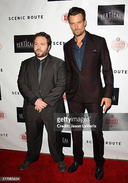 Actors Dan Fogler and Josh Duhamel attend the premiere of "Scenic Route" at Chinese 6 Theater Hollywood on August 20, 2013 in Hollywood, California.