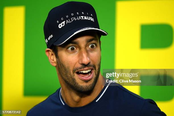 Daniel Ricciardo of Australia and Scuderia AlphaTauri reacts in the Drivers Press Conference during previews ahead of the F1 Grand Prix of Brazil at...