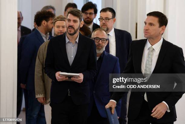 Oz Ben David and Jalil Dabit , co-owners of the Israeli-Palestinian restaurant Kanaan in Berlin, along with other participants arrive for talks...