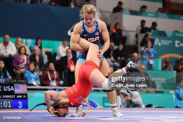 Forrest Molinari of Team United States and Virginia Jimenez of Team Chile fight on Wrestling - Women's Freestyle 57Kg Quarterfinals at Centro de...