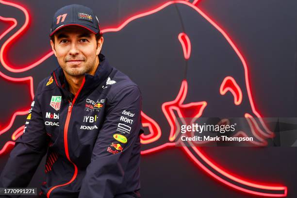Sergio Perez of Mexico and Oracle Red Bull Racing looks on in the Paddock during previews ahead of the F1 Grand Prix of Brazil at Autodromo Jose...
