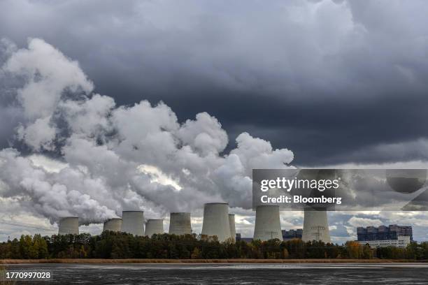 Cooling towers at the Jaenschwalde lignite coal-fired power plant, in Peitz, Germany, on Tuesday, Nov. 7, 2023. German Economy Minister Robert Habeck...