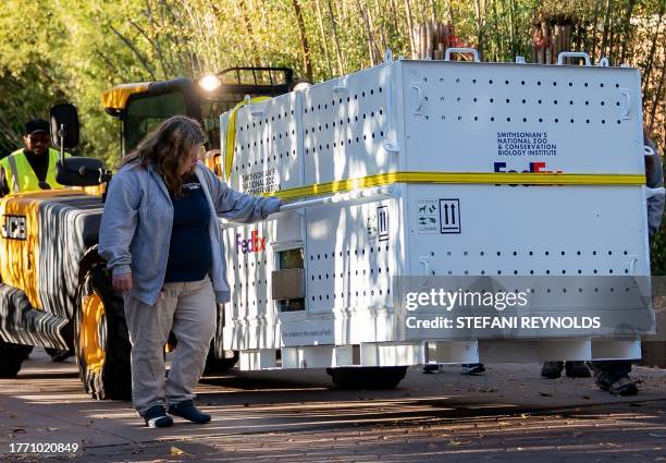 Crate carrying Panda Mei Xiang is moved out of the Smithsonian's National Zoo in Washington, DC, on November 8, 2023. All three of the zoo's pandas...