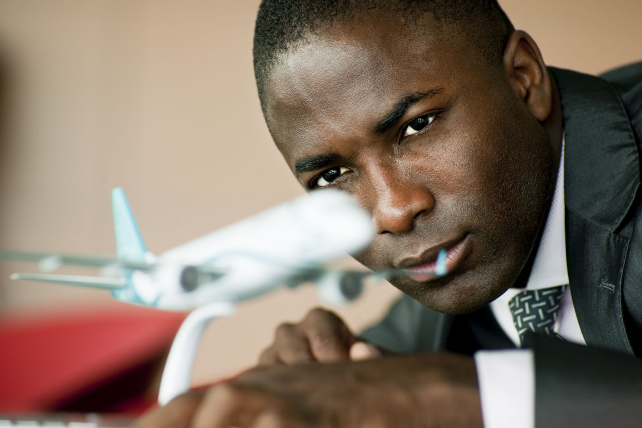 Young Engineer With His Airplane Model Young Engineer With His Airplane Model