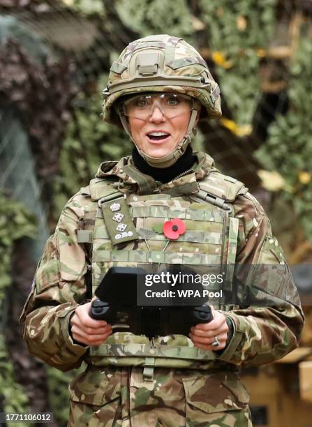Catherine, Princess of Wales flies a drone as she visits The Queen's Dragoon Guards Regiment for the first time as their Colonel in Chief on November...