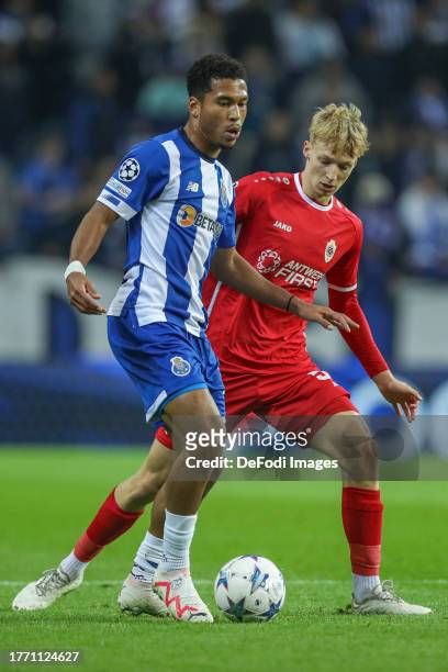 Danny Namaso of Porto and Kobe Corbanie of Antwerp in action during the UEFA Champions League match between FC Porto and Royal Antwerp FC at Estadio...