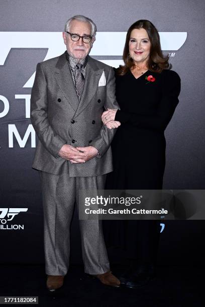 Brian Cox and Barbara Broccoli arrive at the "007: Road To A Million" Premiere at Battersea Power station on November 02, 2023 in London, England.