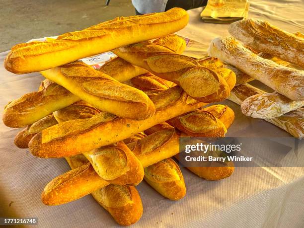french bread for sale at local market in ajaccio - ajaccio stock pictures, royalty-free photos & images