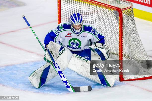 Goaltender Joey Rocha of the Swift Current Broncos guards the net during first period action against the Brandon Wheat Kings at Westoba Place on...