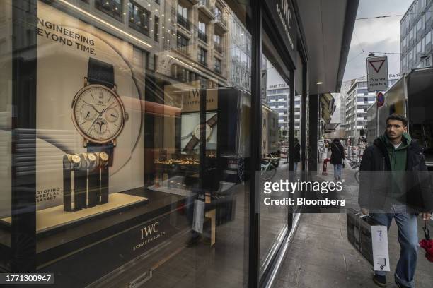 The window display of an IWC Schaffhausen luxury watch store in Geneva, Switzerland, on Tuesday, Nov. 7, 2023. The Swiss franc has gained about 3%...