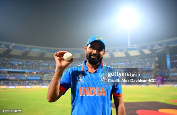 Mohammed Shami of India poses after taking five wickets following the ICC Men's Cricket World Cup India 2023 between India and Sri Lanka at Wankhede...