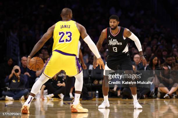 Paul George of the Los Angeles Clippers guards LeBron James of the Los Angeles Lakers during the fourth quarter at Crypto.com Arena on November 01,...