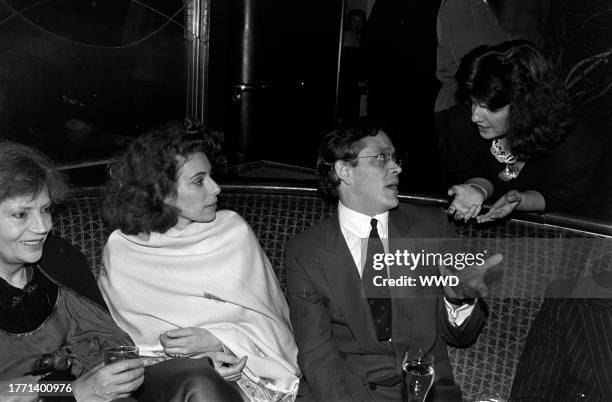 Merel Poloway , Raul Julia , and guests attend a party at Club A in New York City on May 22, 1984.