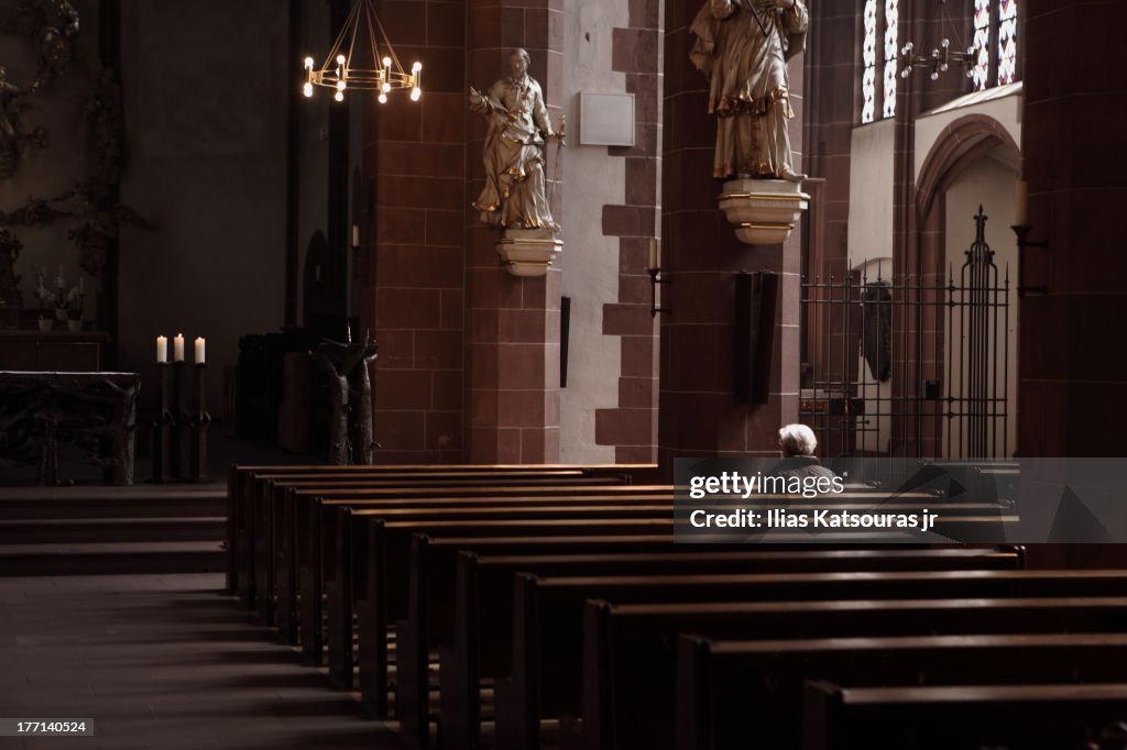 Woman in empty church