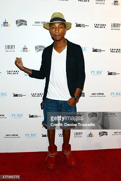 Pharrell Williams arrives at PURE Nightclub on August 20, 2013 in Las Vegas, Nevada.Ê