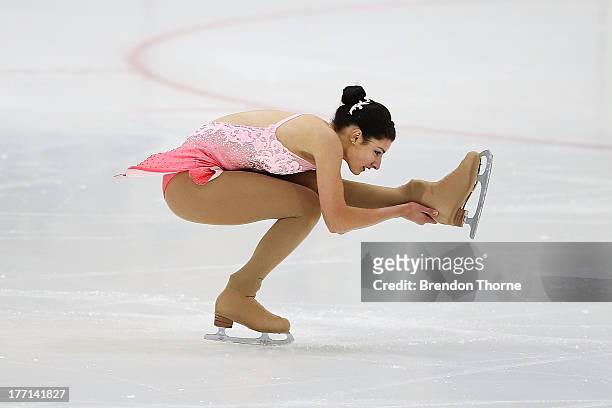 Chantelle Kerry of Australia competes in the Senior Ladies Short Program during Skate Down Under at Canterbury Olympic Ice Rink on August 21, 2013 in...