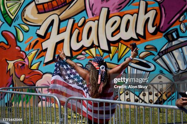 Supporters arrive at the venue as former U.S. President Donald Trump is set to deliver remarks at The Ted Hendricks Stadium at Henry Milander Park on...