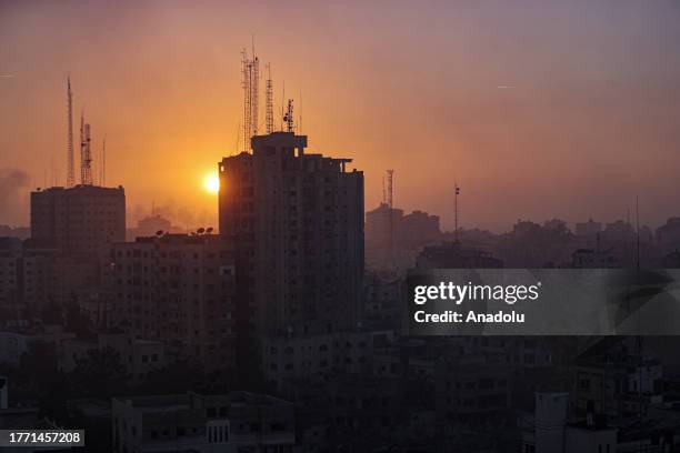 Smoke rises in some areas as a result of the Israeli attacks that continued during sunset on the 33rd day, in Gaza City, Gaza on November 08, 2023.