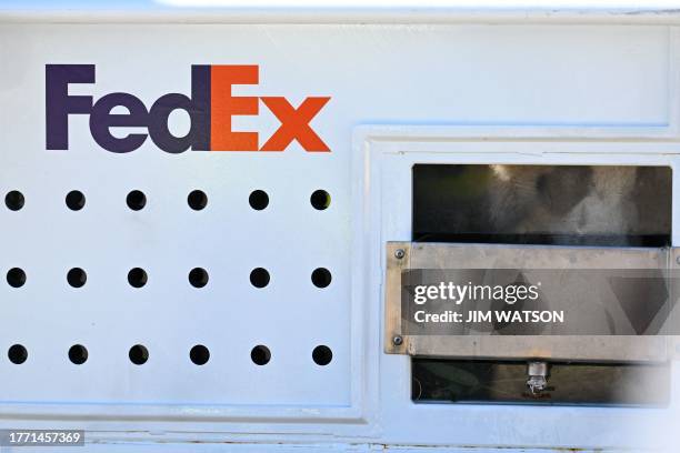 Crate carrying Giant Panda Mei Xiang is unloaded at Dulles International Airport in Dulles, Virginia, on November 8, 2023. All three of the zoo's...