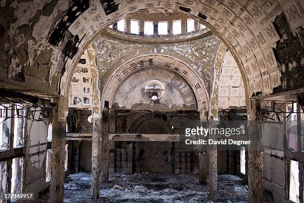 The remains of a church in Mallawi after it was looted and set on fire, August 18, 2013. Morsi supporters gathered after Friday prayers to storm and...