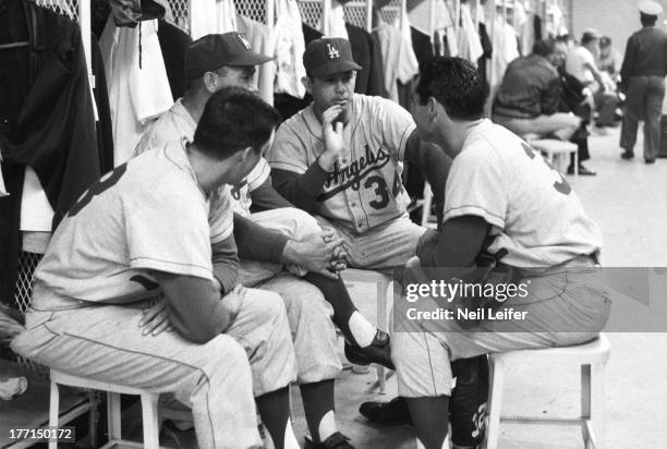 Los Angeles Dodgers Norm Sherry with teammates in locker room during rain delay vs Philadelphia Phillies at Connie Mack Stadium. Philadelphia, PA...