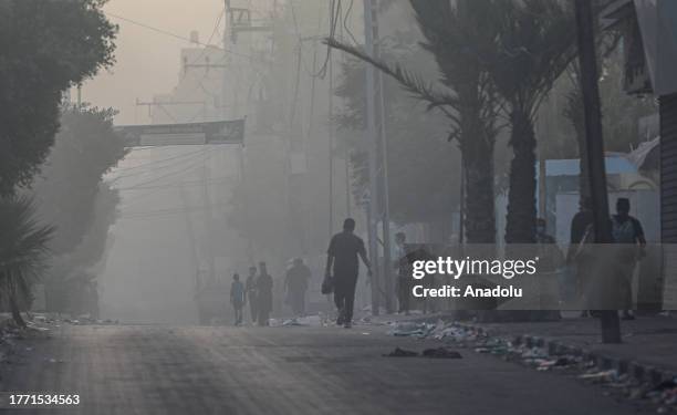 Palestinian families forced to flee from Al-Shati Refugee Camp to central and southern parts of Gaza Strip due to Israeli attacks that continue on...