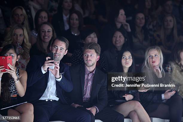 Guests sit front row at the runway at the General Pants show during Mercedes-Benz Fashion Festival Sydney 2013 at Sydney Town Hall on August 21, 2013...