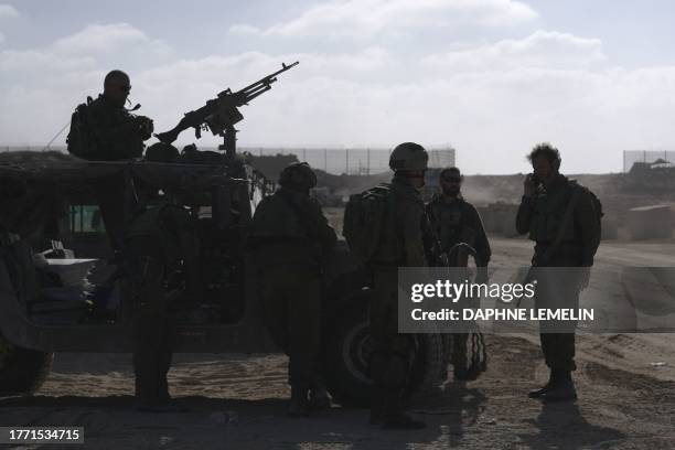 Israeli troops are pictured near the border fence between Israel and the Gaza Strip ahead of an operation in the north of the Palestinian enclave on...