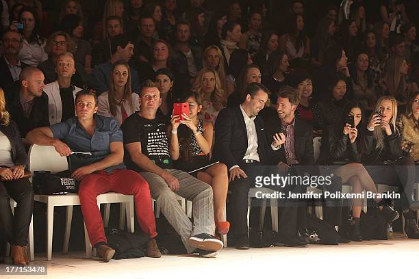 Guests sit front row at the runway at the General Pants show during Mercedes-Benz Fashion Festival Sydney 2013 at Sydney Town Hall on August 21, 2013...