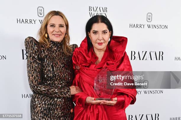 Kim Cattrall and Marina Abramovic, winner of the Artist award, pose at the Harper's Bazaar Women of the Year Awards 2023 at Claridge's Hotel on...