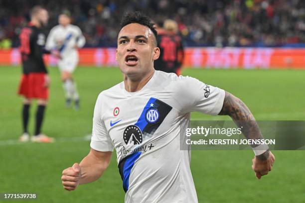 Inter Milan's Argentine forward Lautaro Martinez celebrates scoring the opening goal during the UEFA Champions League Group D football match between...
