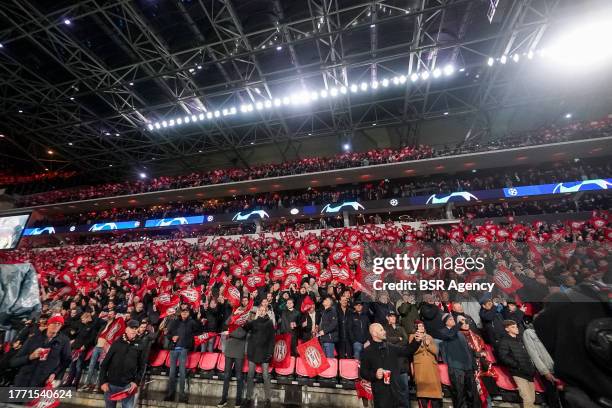 Fans and Supporters of PSV waving many flags during the UEFA Champions League Group B match between PSV and RC Lens at Philips Stadion on November 8,...